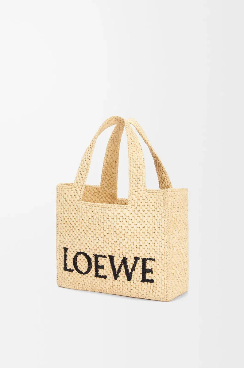 kleine loewe font tragetasche aus bast natur