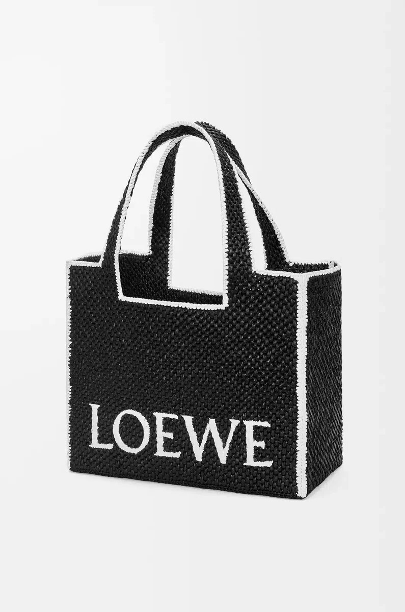 große loewe font tote aus bast schwarz