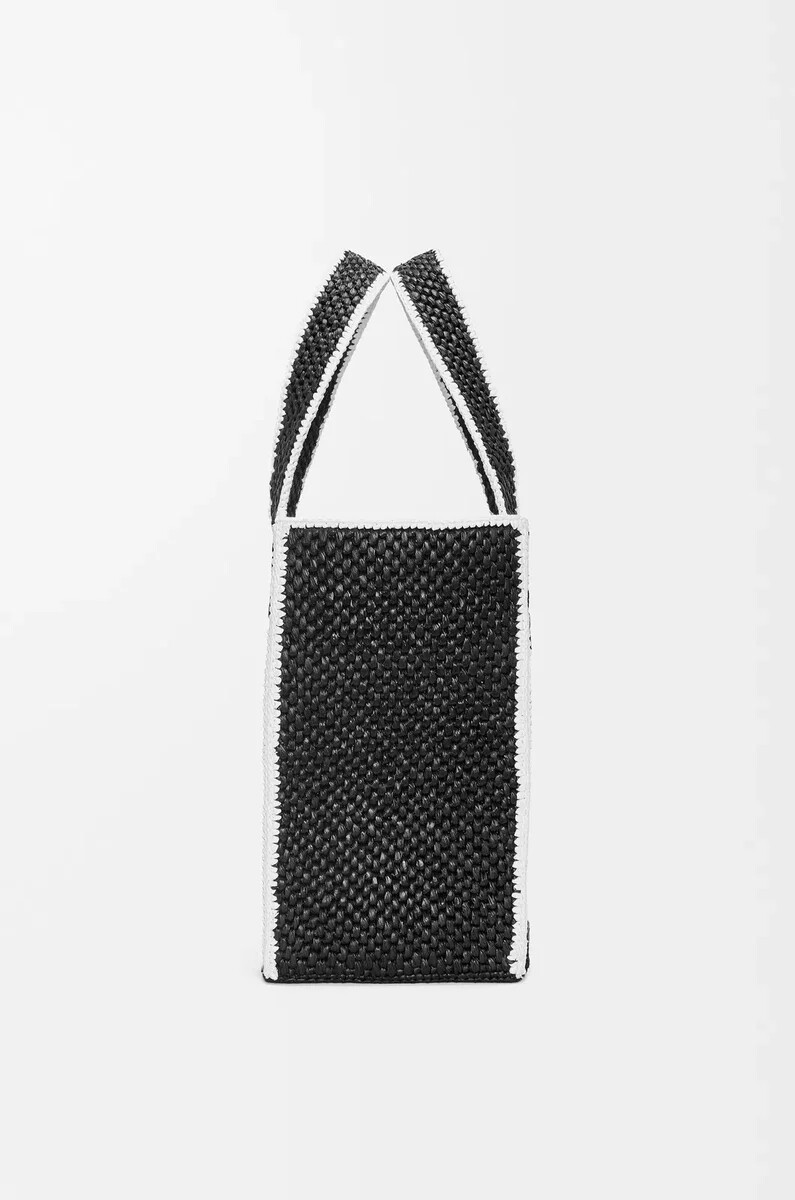 große loewe font tote aus bast schwarz