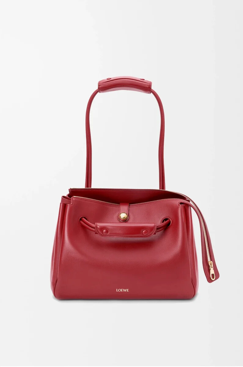 mittelgroße madrid-tasche aus geschmeidigem kalbsleder in der farbe burnt red