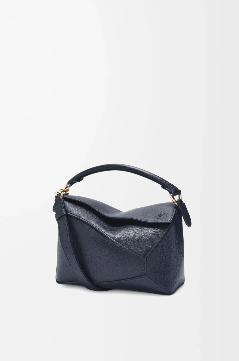kleine puzzle edge tasche aus weichem genarbtem kalbsleder in dunkelblau