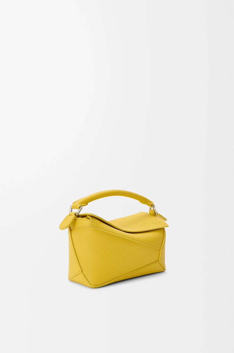 mini puzzle edge tasche aus weichem genarbtem kalbsleder dandelion