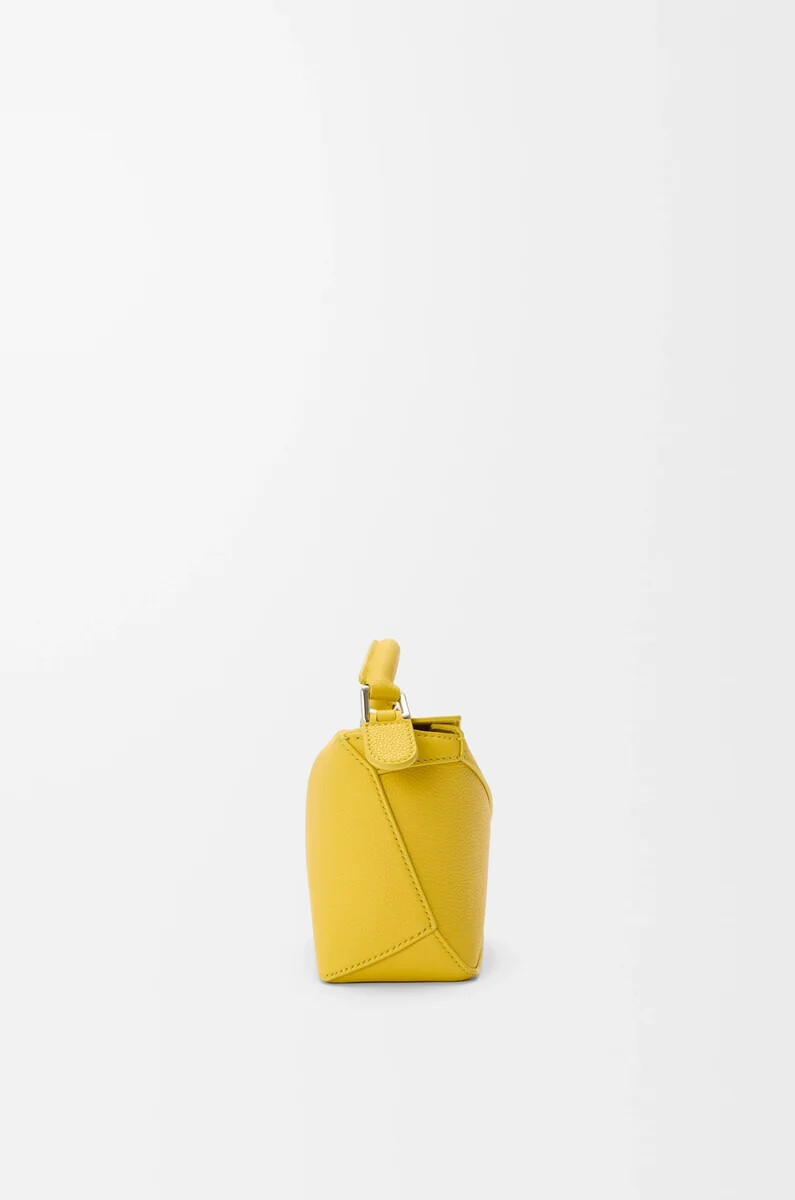 mini puzzle edge tasche aus weichem genarbtem kalbsleder dandelion