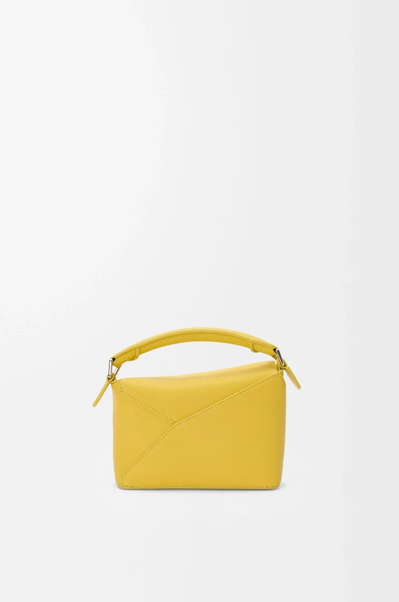 mini puzzle edge tasche aus weichem genarbtem kalbsleder dandelion