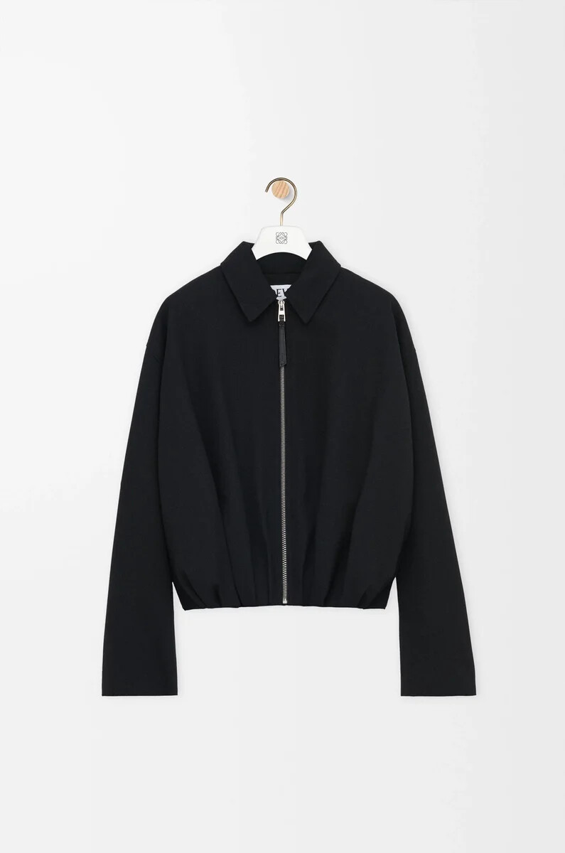 drapierte jacke aus schwarzer wolle