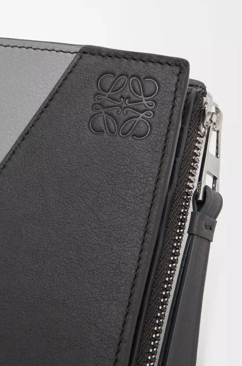 puzzle slim compact wallet aus klassischem kalbsleder in asphaltgrausturmblau